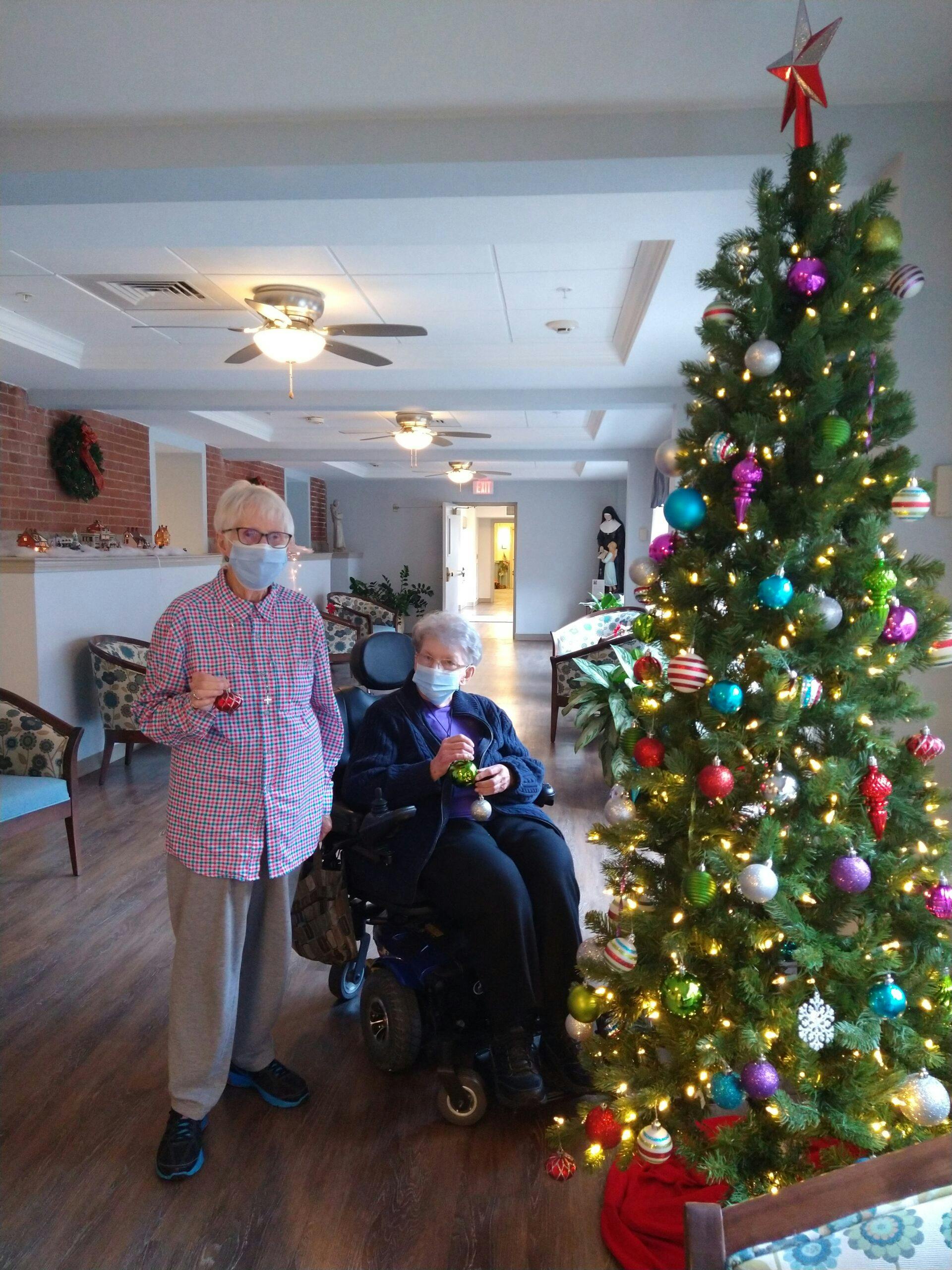 Some of our residents enjoying tree decorating